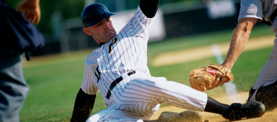 Baseball player in the middle of a game.